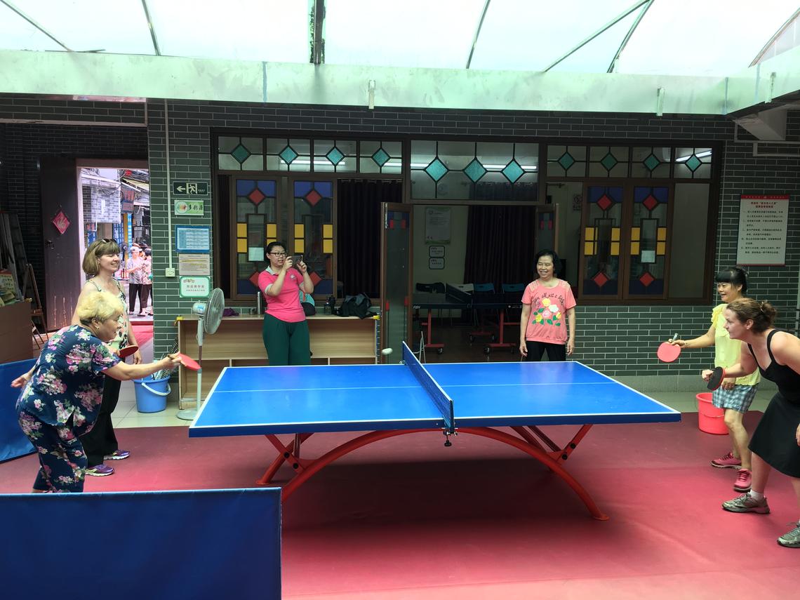 In between symposium presentations and meetings, the delegates also found time for a few friendly games of table tennis. 