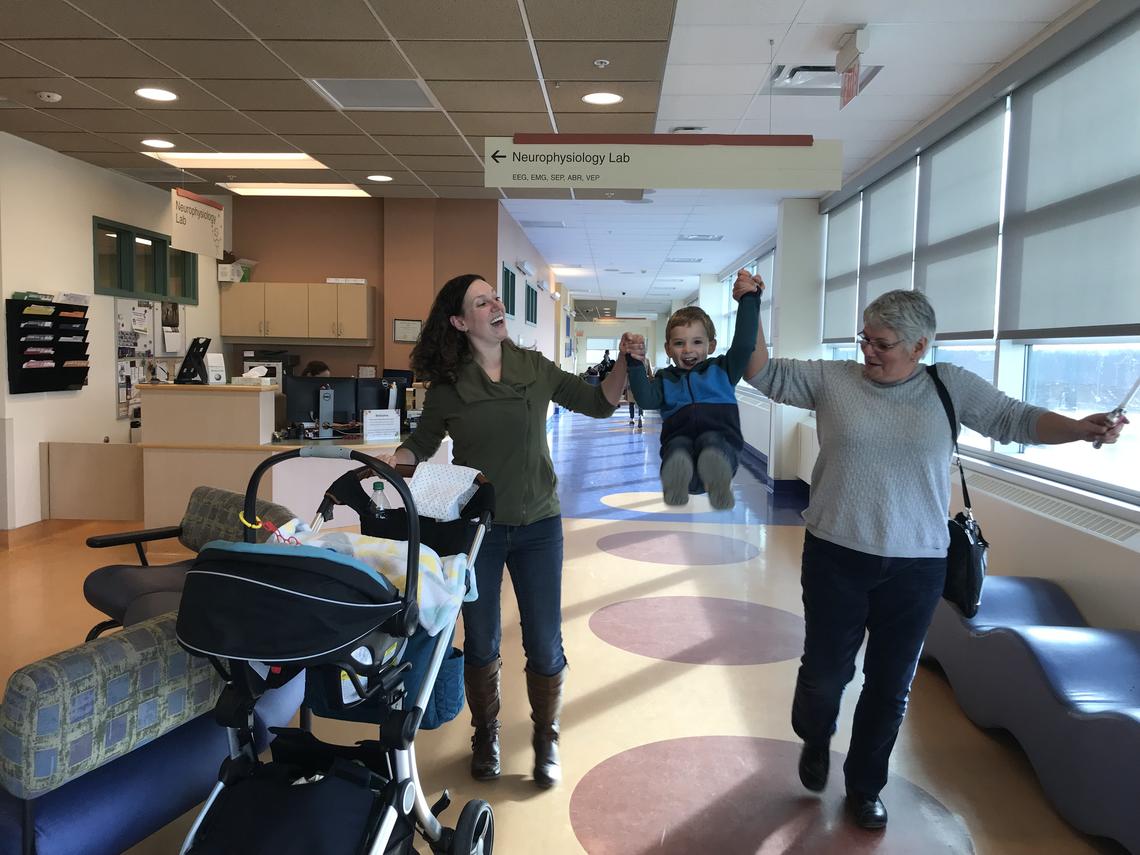 Melanie Tibbetts, left, gives her son Wyatt a swing, along with Wyatt's Grammie, Cheryl MacKay. Tibbits says the results of this study will help her make a more informed choice for her children.
