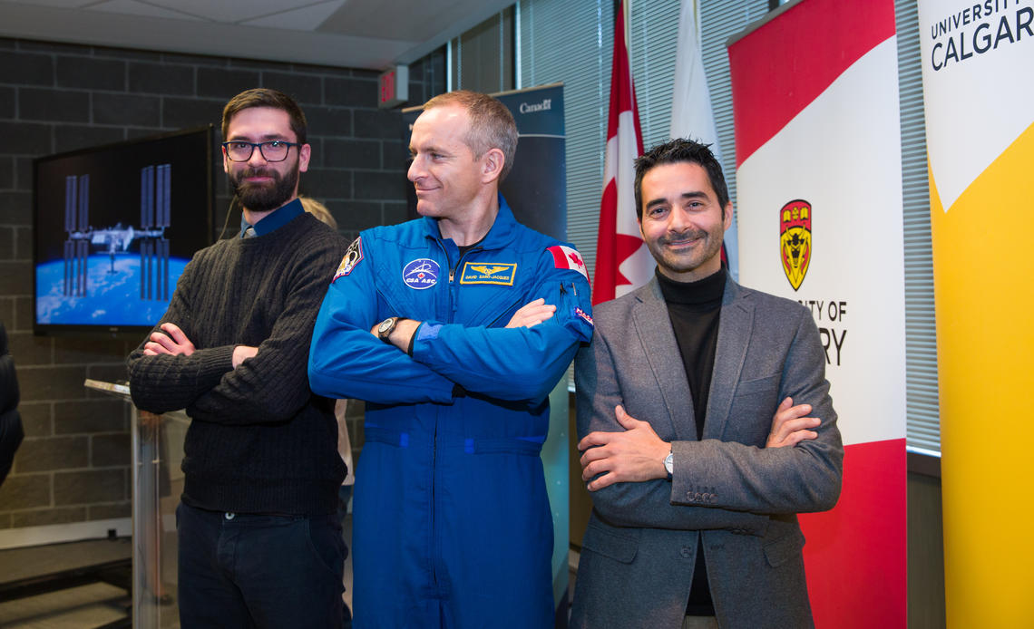 Funding for University of Calgary researcher Giuseppe Iaria's Wayfinding project was announced on Wednesday by the Canadian Space Agency. Pictured with Iaria, at right, are Canadian astronaut David Saint-Jacques, centre, and grad student Ford Burles, a member of the Wayfinding team.