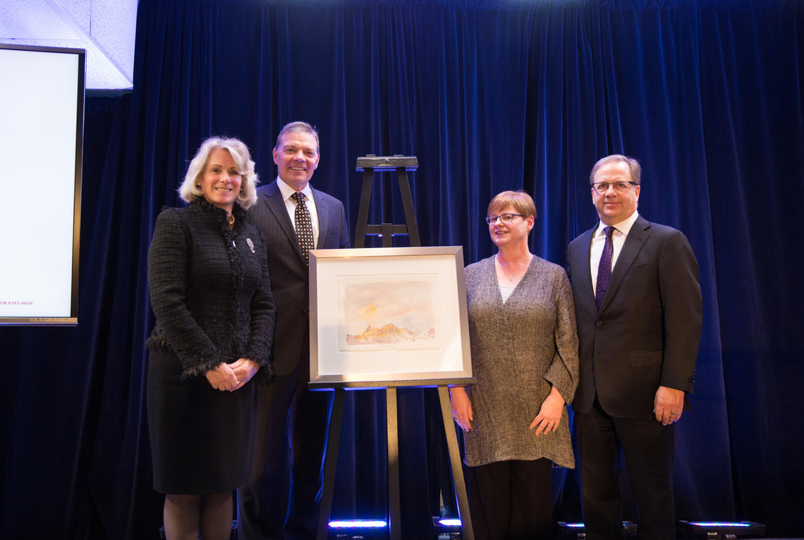 University of Calgary President Elizabeth Cannon, left, and Faculty of Arts Dean Richard Sigurdson celebrate the opening of the clinic Tuesday with donors Lori Egger and Steve Laut. 