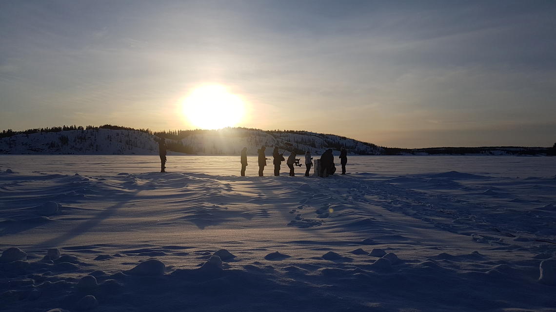 Huddled next to a frozen lake in the Northwest Territories, the Faculty of Science-led team from the University of Calgary conducts experiments in the spring of 2018.
