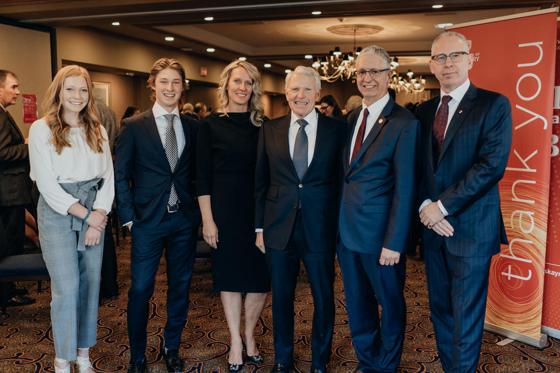 From left: Rory Peters, Brennan Peters, Ruth Peters, Rob Peters, Haskayne Dean Jim Dewald and UCalgary President Ed McCauley. 