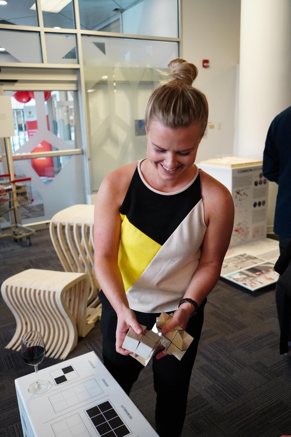 Ashley Ortlieb celebrates the completion of architecture school at the year-end show.