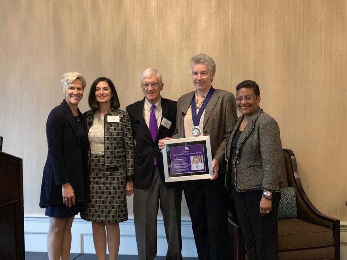 Myriam Hemberger receives the March of Dimes Prize and a silver medal in the design of the Roosevelt dime, in honour of U.S. President Franklin Delano Roosevelt, who founded the March of Dimes.