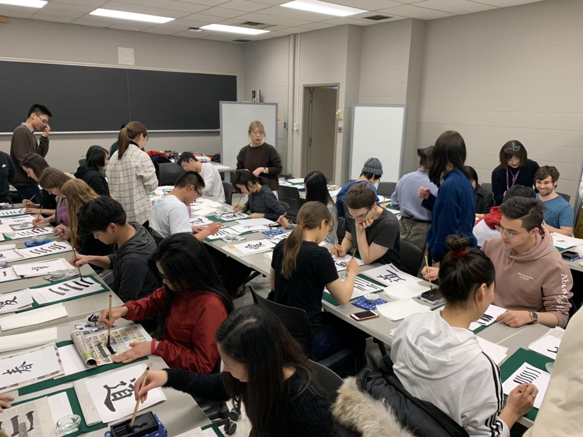 Students learn the art of Japanese Calligraphy