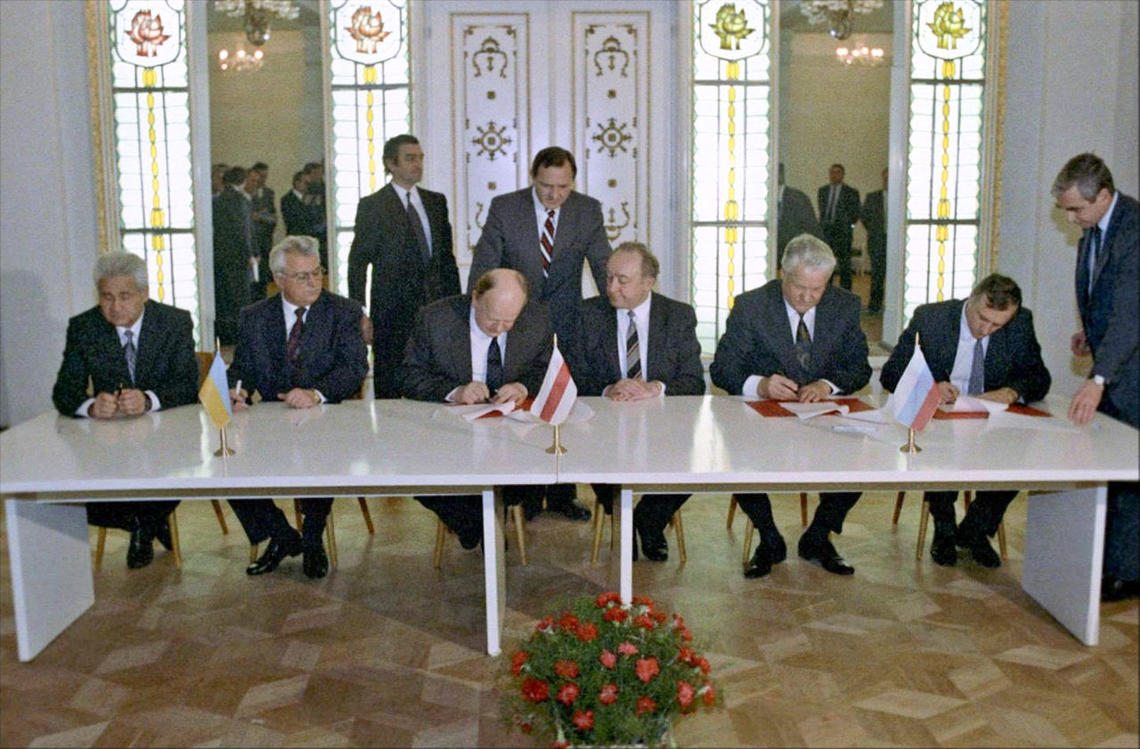 Signing the agreement to dismantle the former Soviet Union and establish the Commonwealth of Independent States in December 1991. 