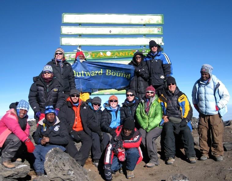 Patrick Daniel, top right, at summit of Mt. Kilimanjaro