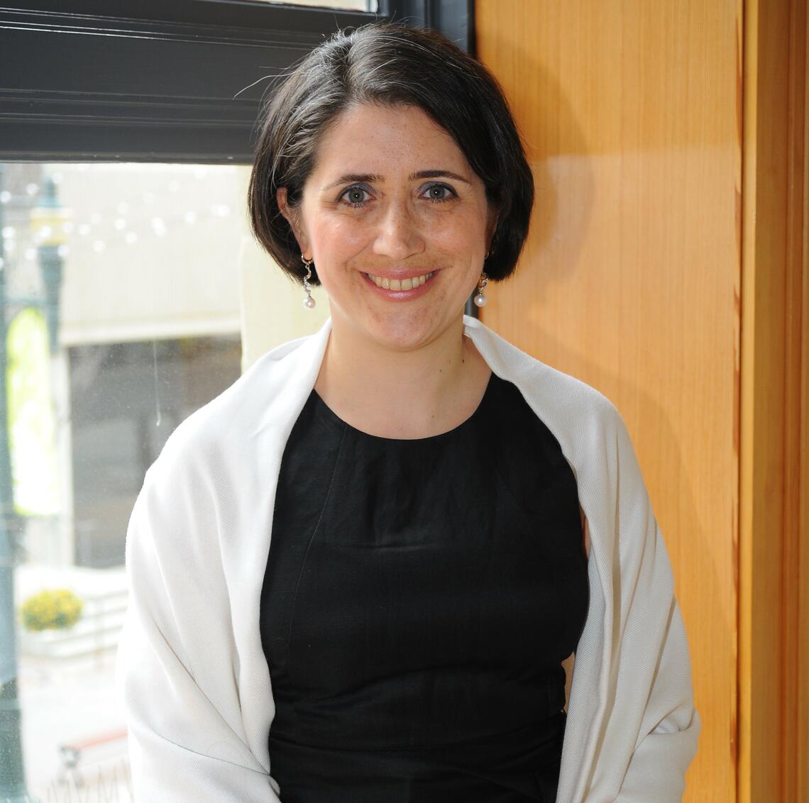 Dr. Laleh Behjat posing in front of a window.