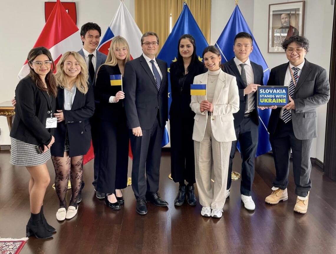 Liyan Alkawafhah, third from right, and other members of the University of Calgary Model UN team meet with Vit Koziak, Slovak Republic ambassador to Canada.