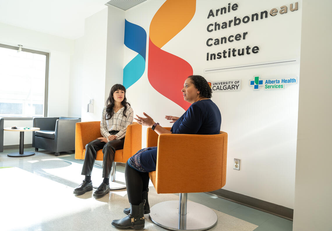 Milan Heck, left, and Mona Shafey discuss the potential of CAR T-cell therapy on hard to treat cancer's like the Heck's. 