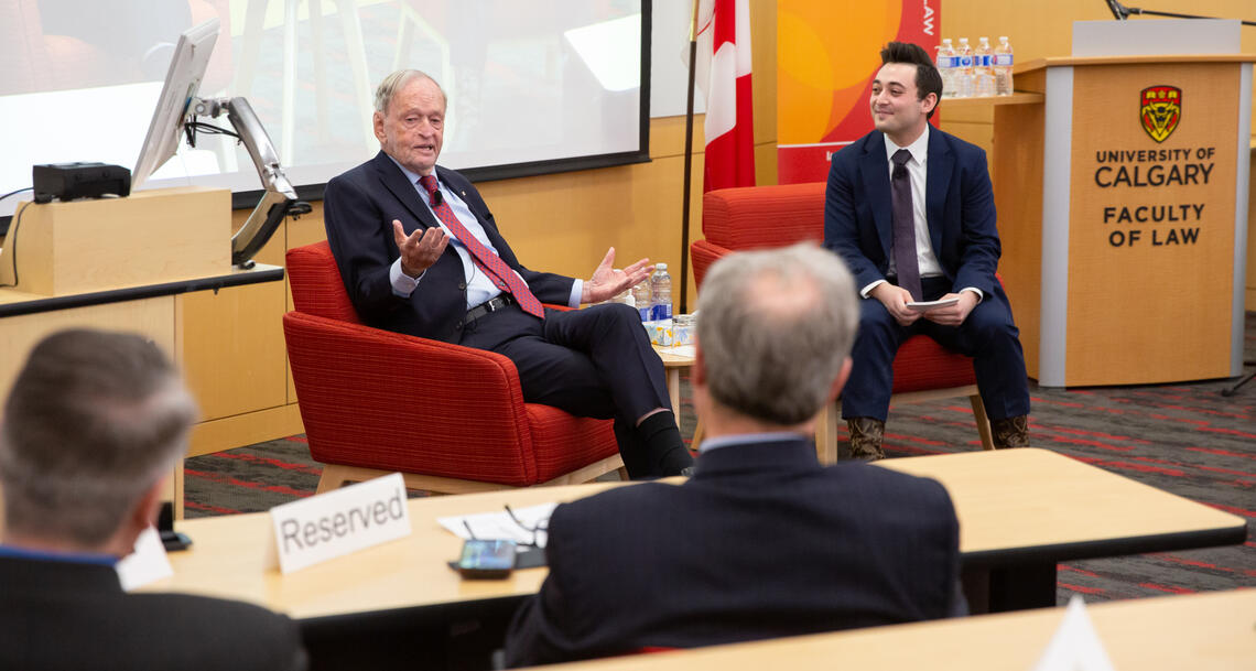 Joel Tallerico acted as host during former Prime Minister Jean Chrétien’s fireside chat at UCalgary Law in April 2023. 