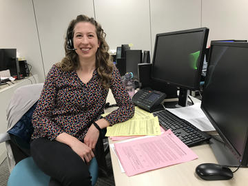 Schulz, answering calls at the 811 Health Link COVID line, assessing patient symptoms and connecting them to Public Health to be tested for COVID-19.