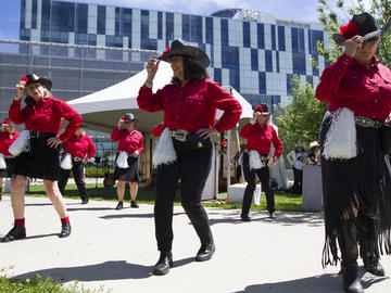 The Chinook Country Line Dancers perform during the President's Stampede BBQ on July 12. 