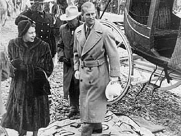 Princess Elizabeth and Prince Philip leaving historic stagecoach during royal visit to Calgary, Alberta