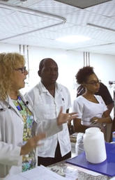 Karen Then, RN PhD, speaks with a group of nurses in training as part of the Guyana Program to Advance Cardiac Care. Photos courtesy Project 7 Media Group