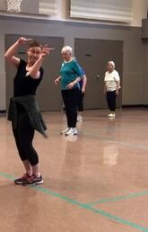 Seniors dancing in exercise class