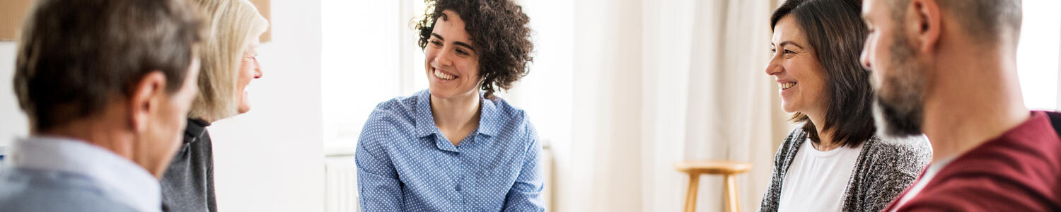 People sitting and supporting each other