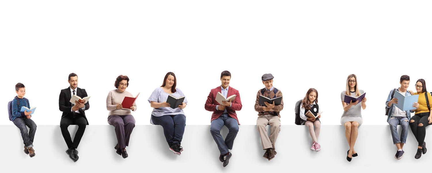 People reading books while seated