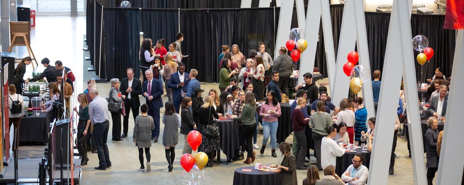 People gathered to celebrate in the HRIC atrium