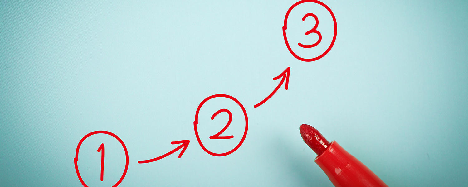 A red marker on a blue background with steps one, two, and three between arrows written in red.