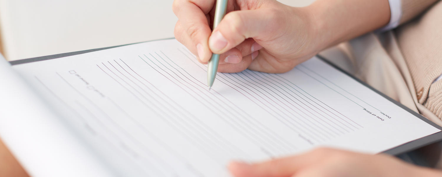 pen filling out form image