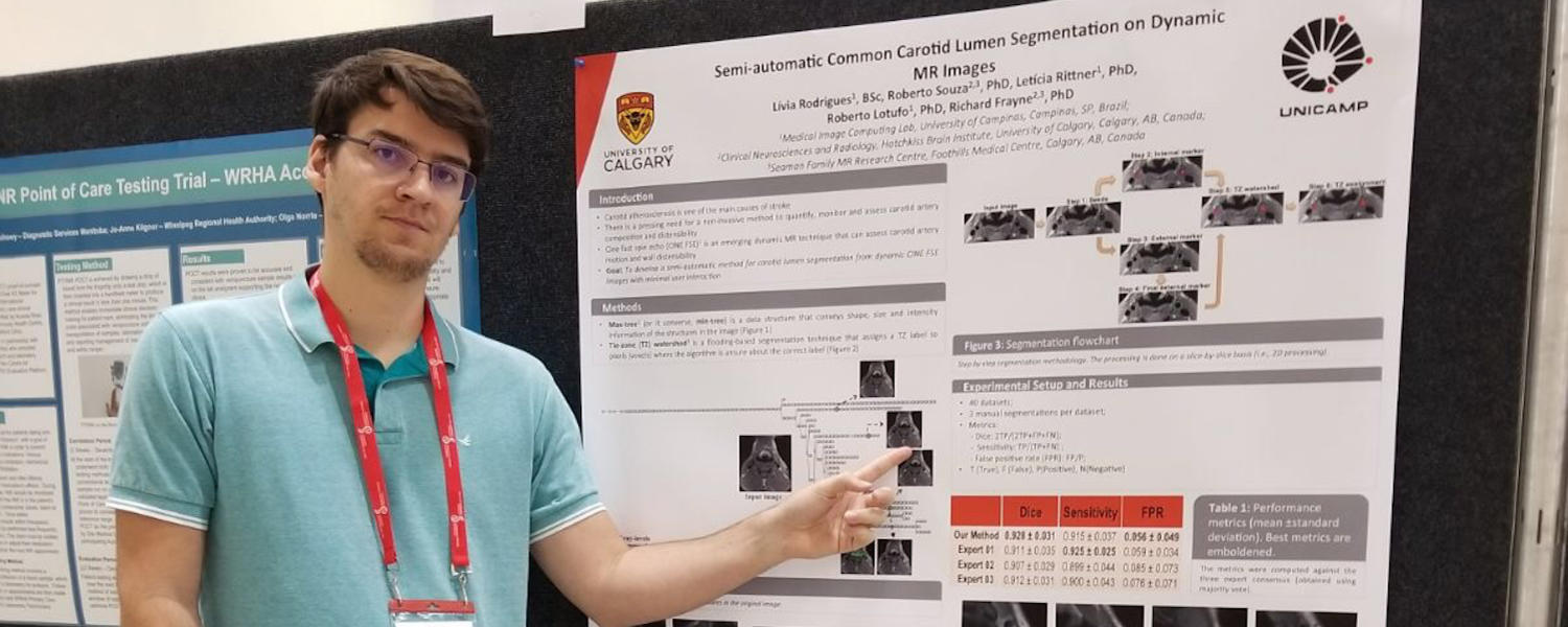 Roberto Souza presenting his poster at the 2019 Alberta Imaging Symposium, Calgary, Alberta.