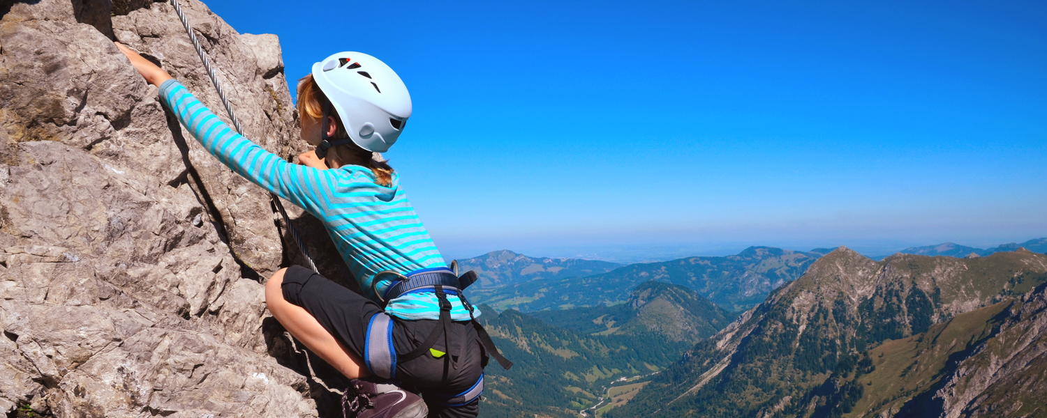Child rock climbing