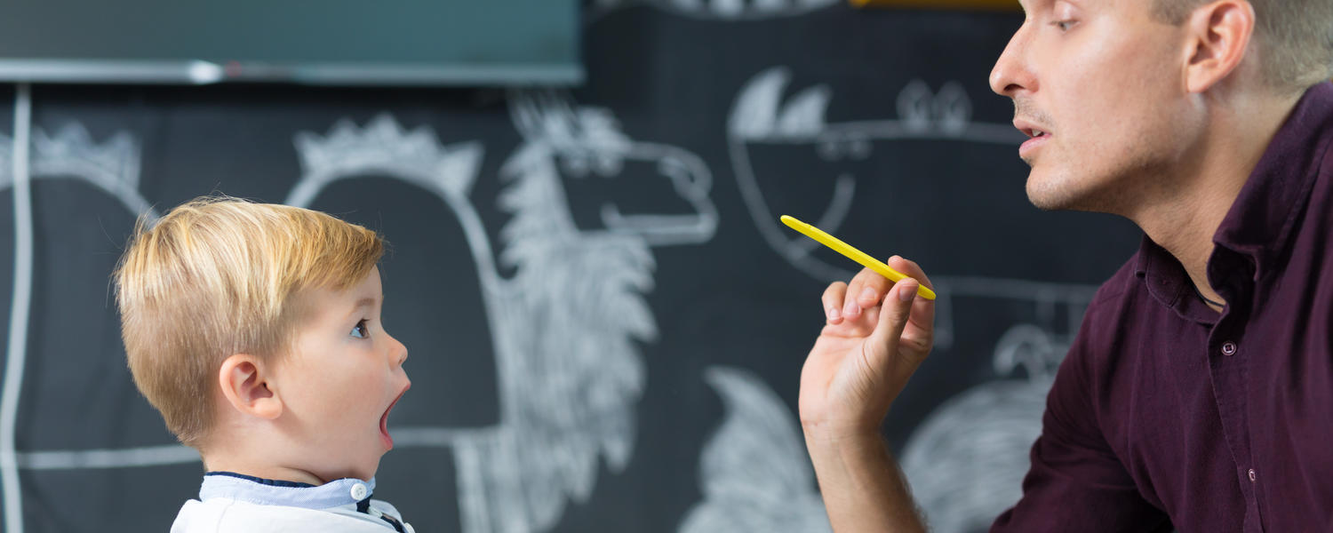 Psychologist interacting with child