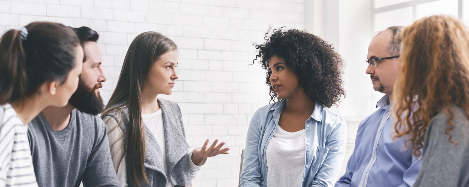 Healthcare professionals talking amongst themselves