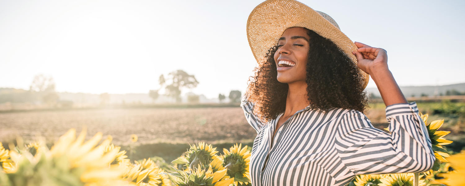 Woman in sunflowers
