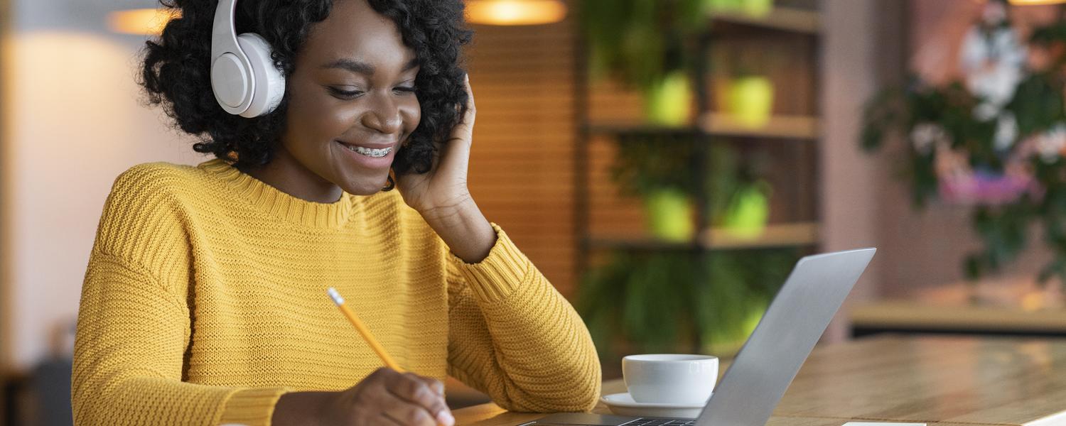 Woman listening to a webinar
