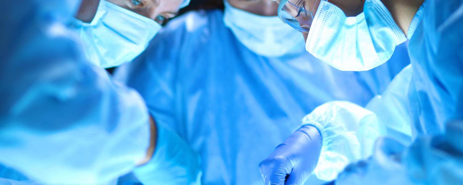 Surgeons operating
