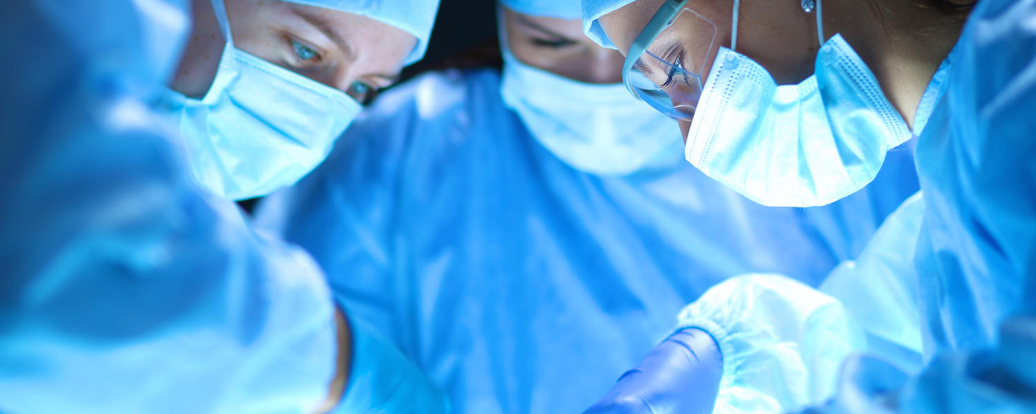 Surgeons operating