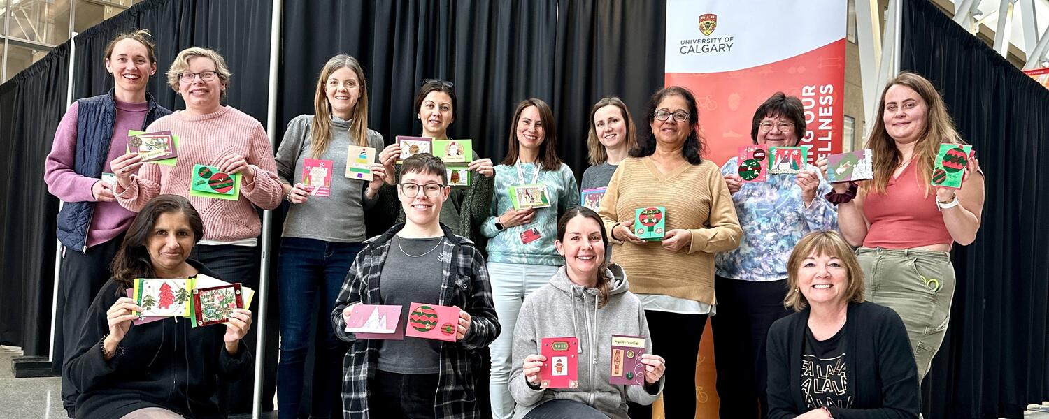 Everyone holding up the cards they made at the Card making LNL