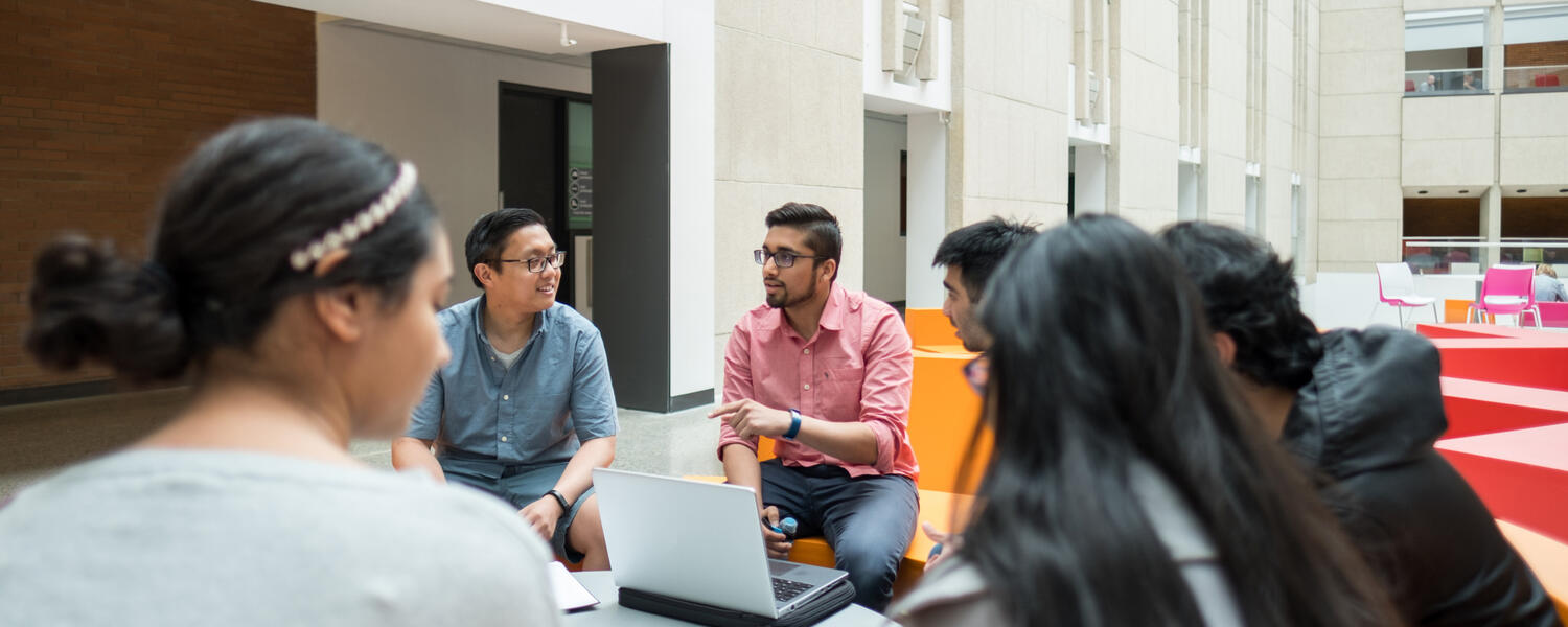 a group of students sitting at a table