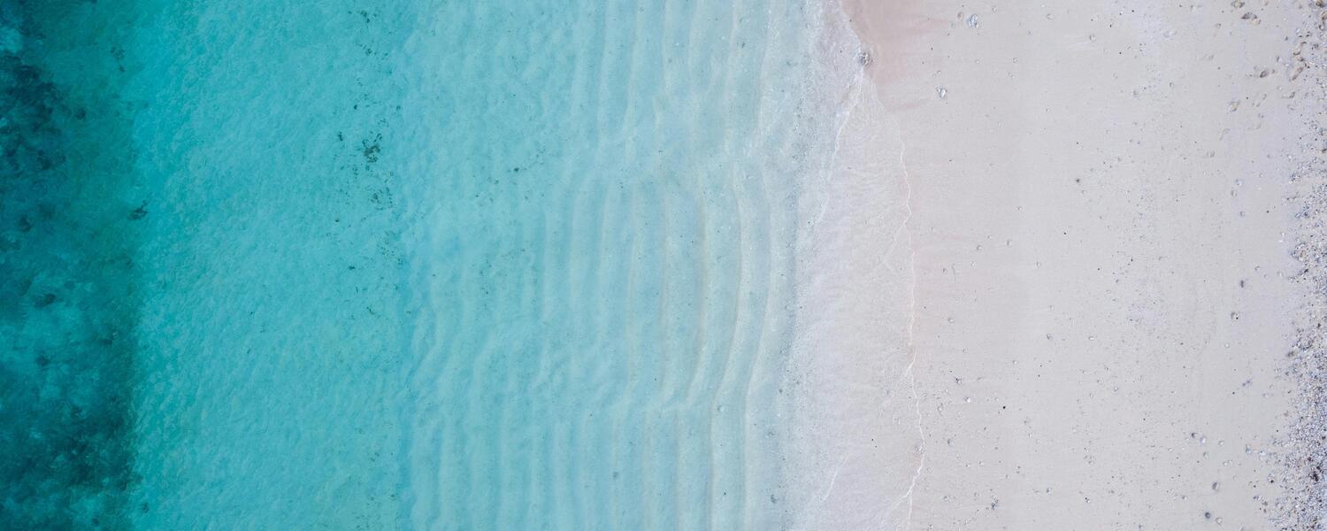 view of beach with sand and water