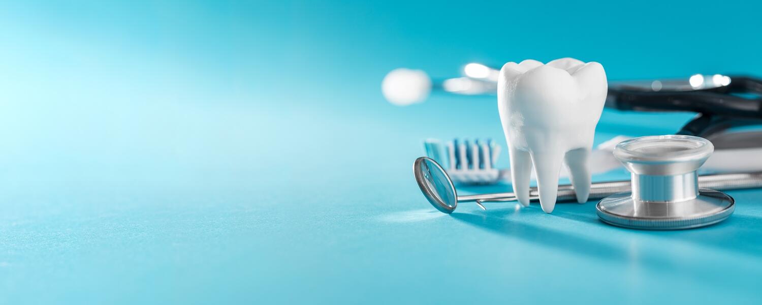 Dentistry tools and a tooth