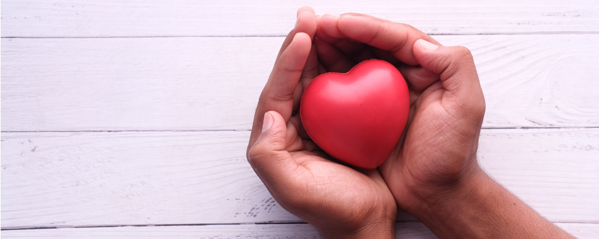 Hands cupping a heart shape