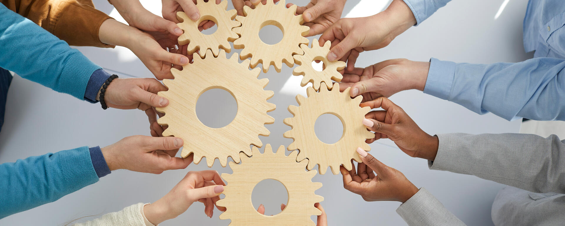 team holding gears