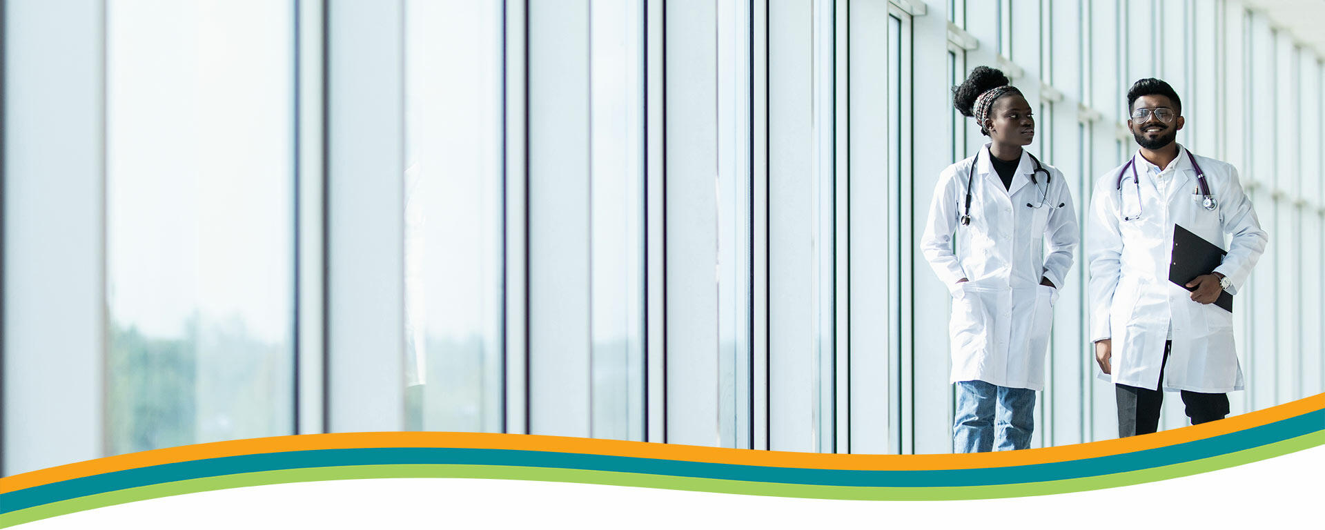 Physicians Walking in the Hallway