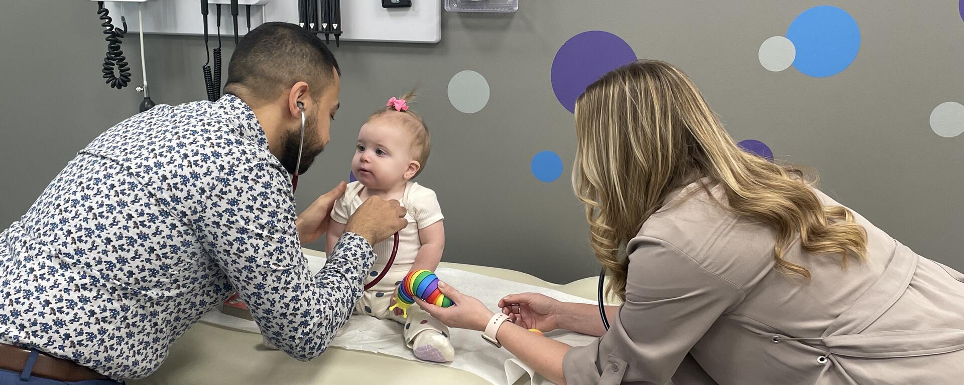 Pediatricians with baby