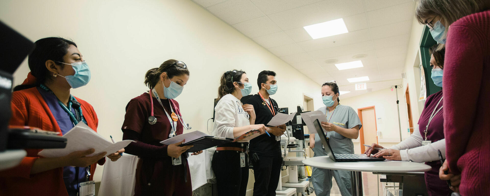 Healthcare team in hospital hallway