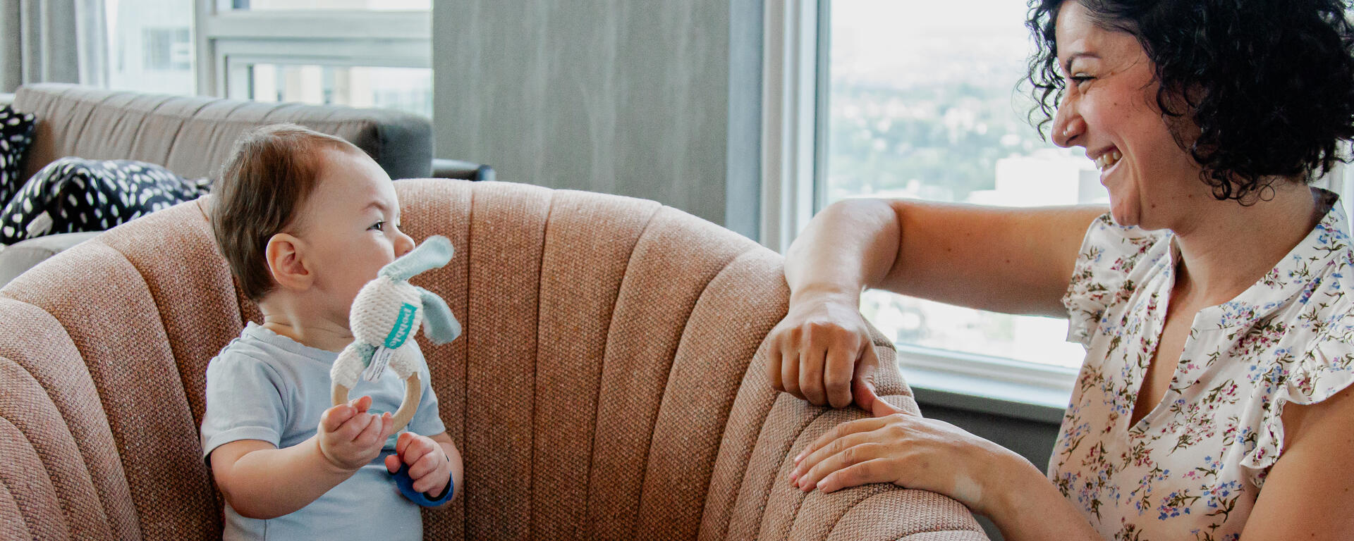 woman smiling at child
