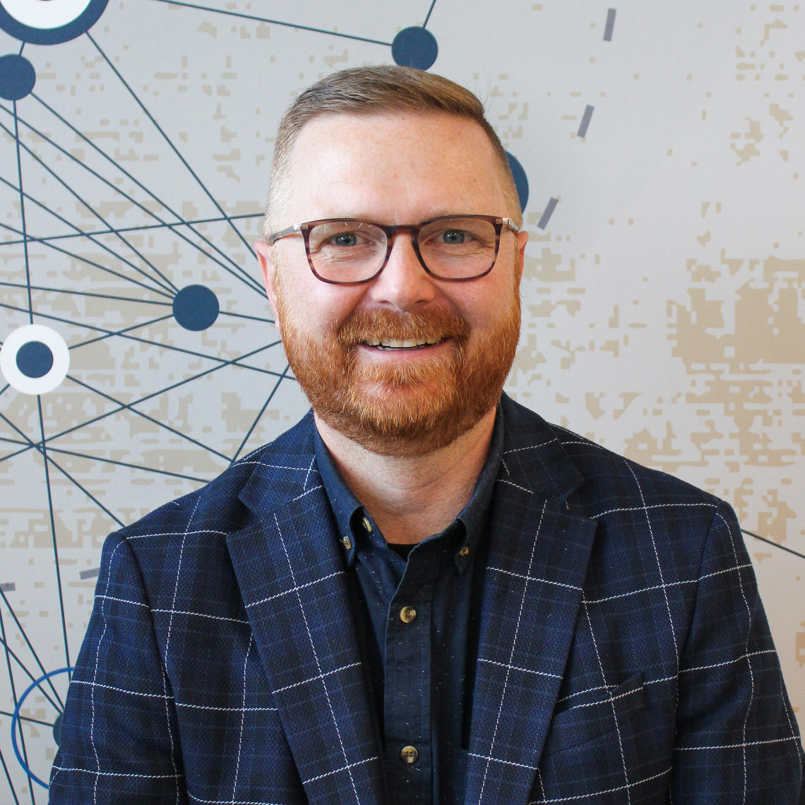 Dr. Tyler Williamson, Director