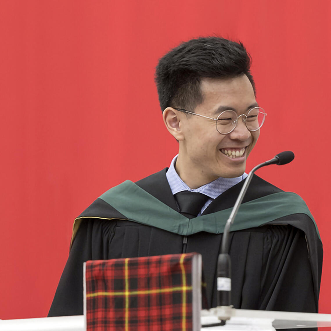 Dr. Mathieu Chin reads the Graduates’ Pledge at his 2023 graduation.