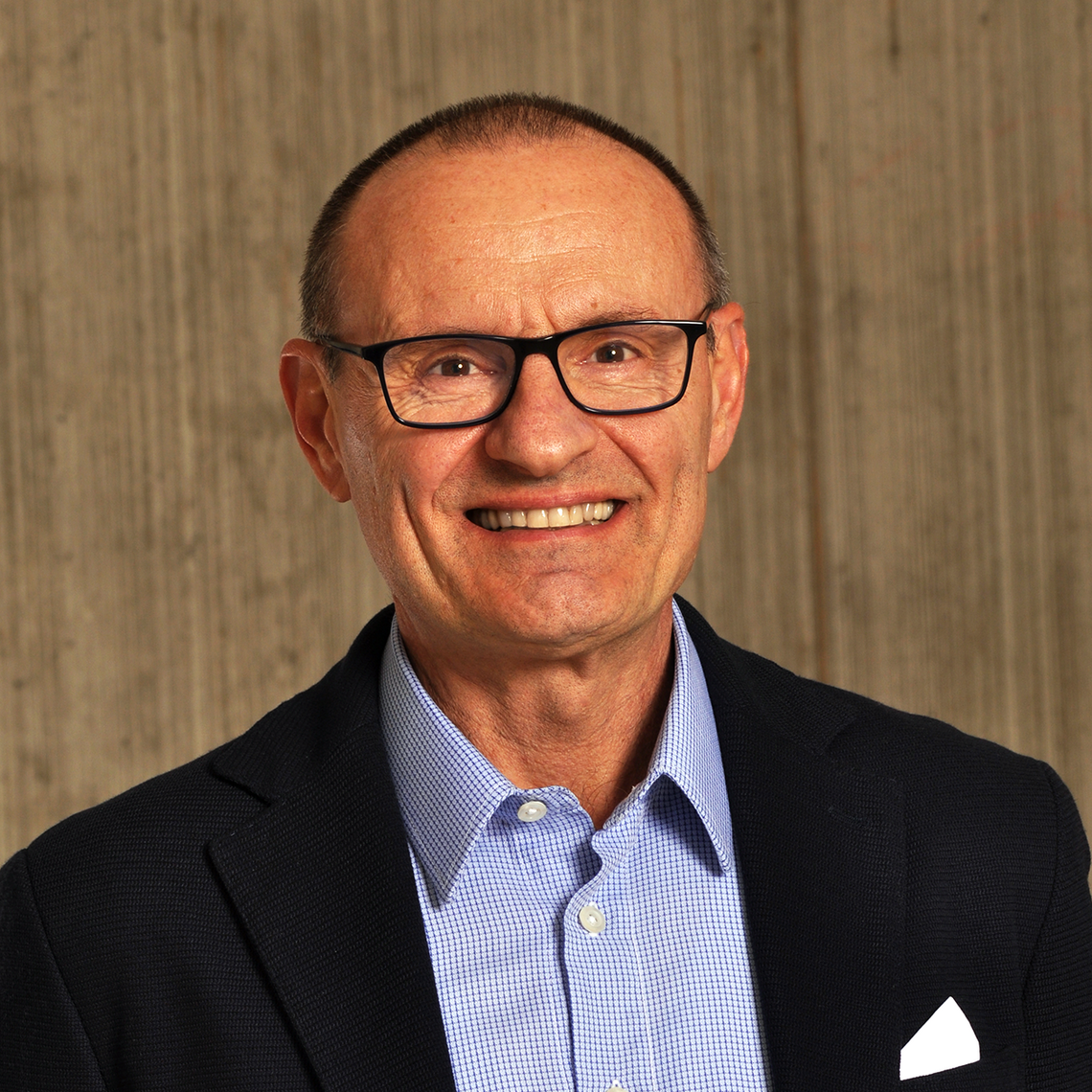 Dr. Pietro Ravani, Professor of Medicine and Roy and Vi Baay Chair in Kidney Research at the University of Calgary, in a professional headshot with a neutral background