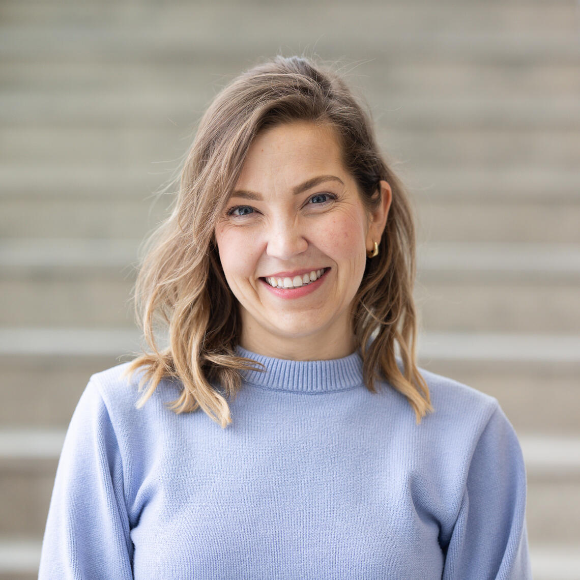 picture of Alicia Hilderley, a smiling woman with light skin and blonde hair