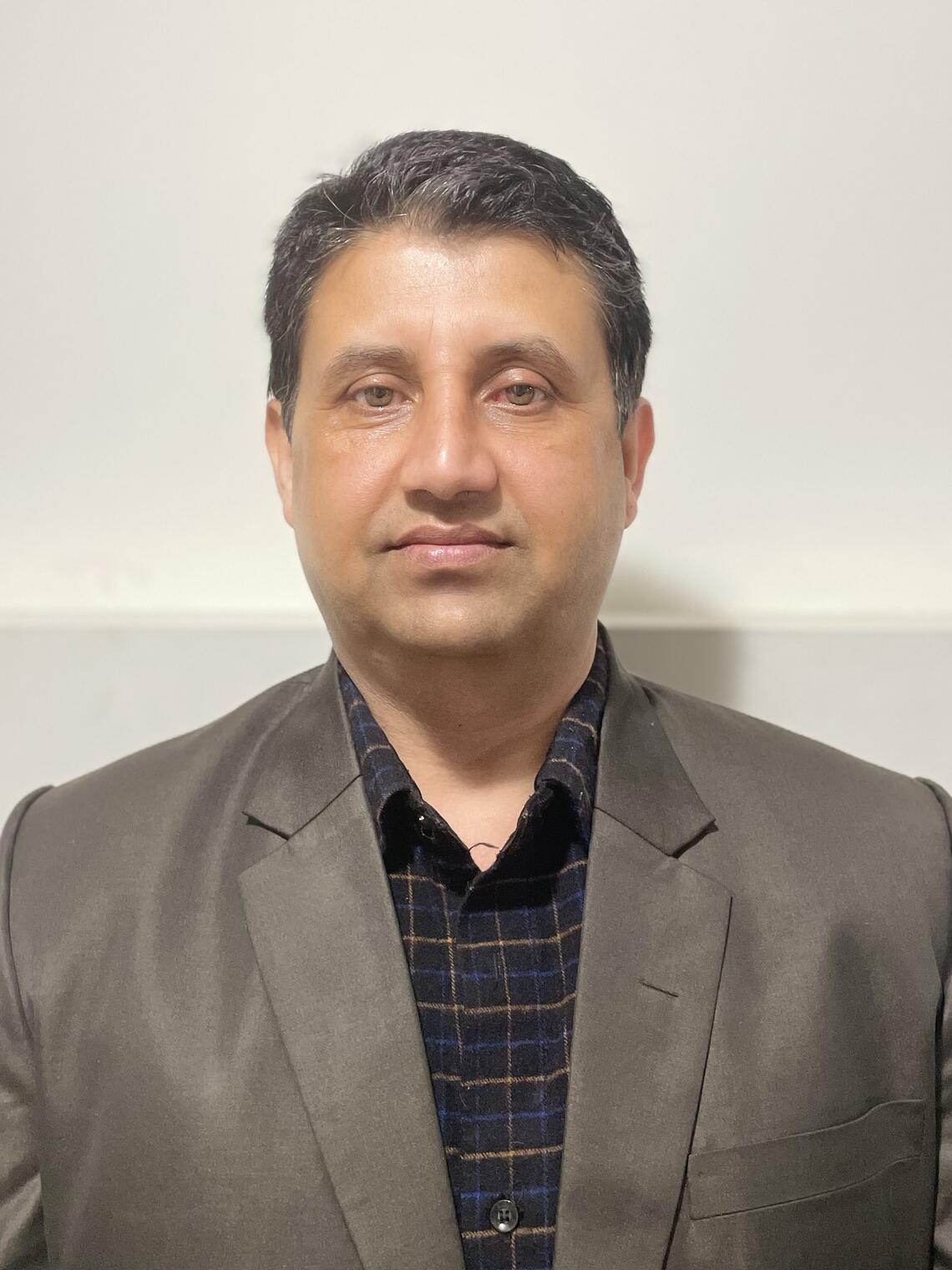 Head shot of Dilaram Acharya