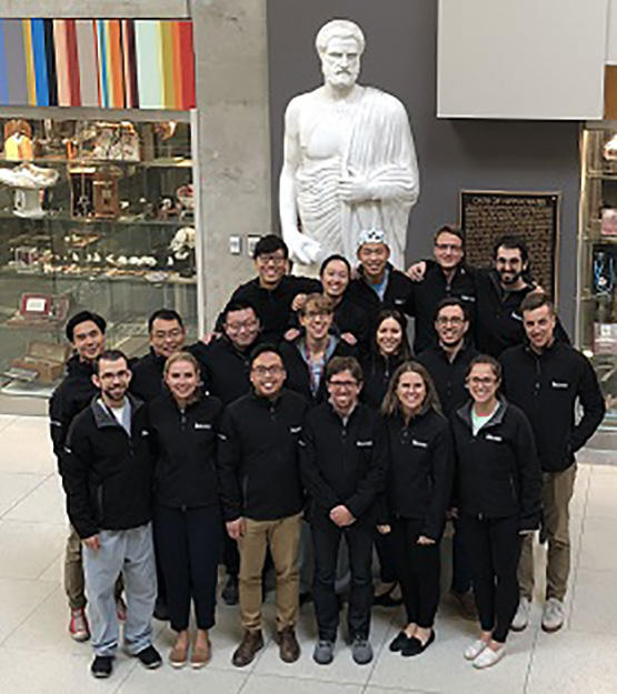 Group picture with statue