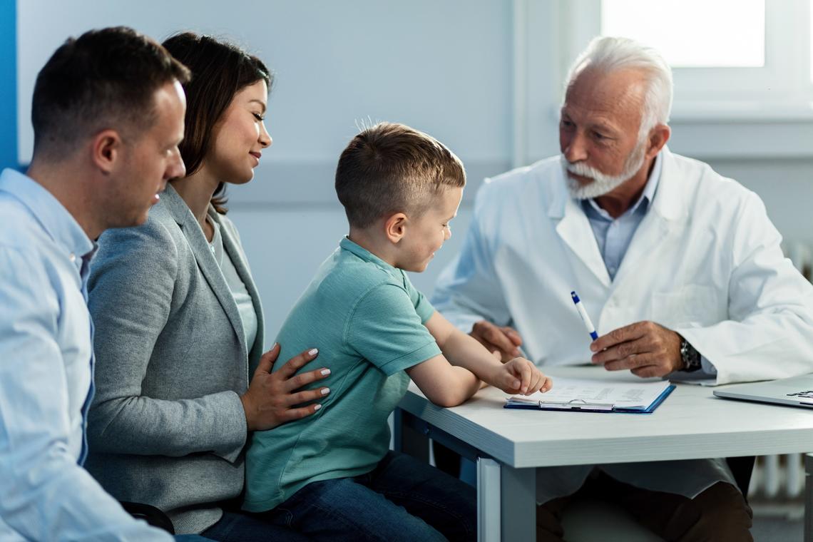 Doctor speaking to a family